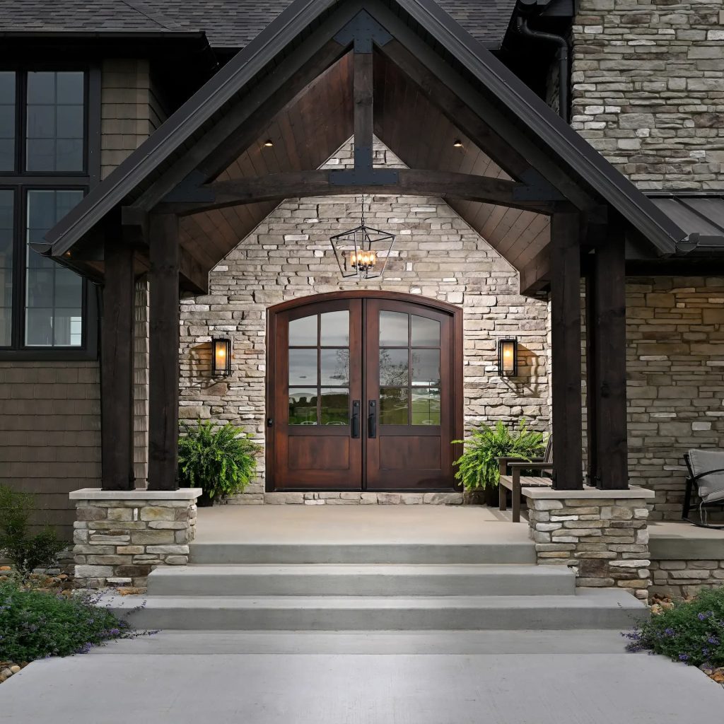 For this custom home, Rockwood built a rustic walnut entry designed for real exterior conditions, with a design that matches the architecture and details that support long-term performance.
